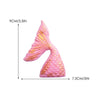 Pink mermaid tail cake topper featuring scales and sea star decorations
