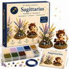 A box set of DIY beaded garden kits featuring a Sagittarius theme with various colored beads and a guide book.