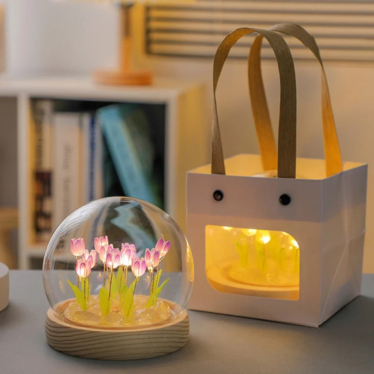 A handmade LED tulip night light in a white box with wooden handles, featuring glowing pink tulips inside.