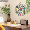 A round wooden wall plaque featuring the inspirational Spanish quote El tiempo de Dios es perfecto surrounded by green leaves