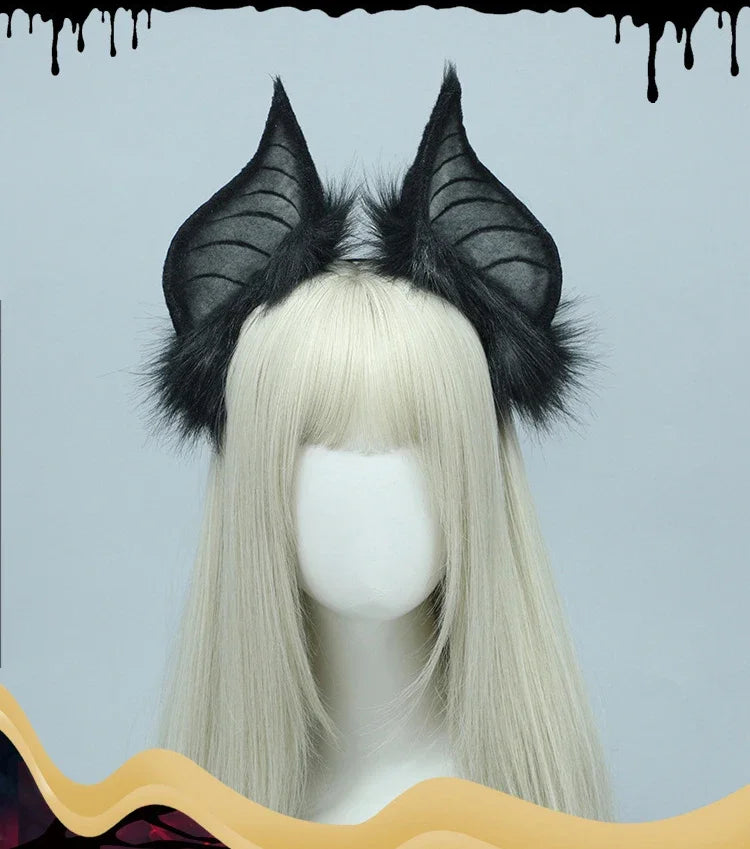 A light blonde wig is shown wearing black bat simulation headwear with feathered ears.
