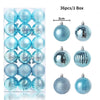 A box containing 36 blue and silver glitter Christmas tree ornament balls.