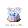 A purple and pink birthday cake decorated with microphones and text, sold as a single piece.