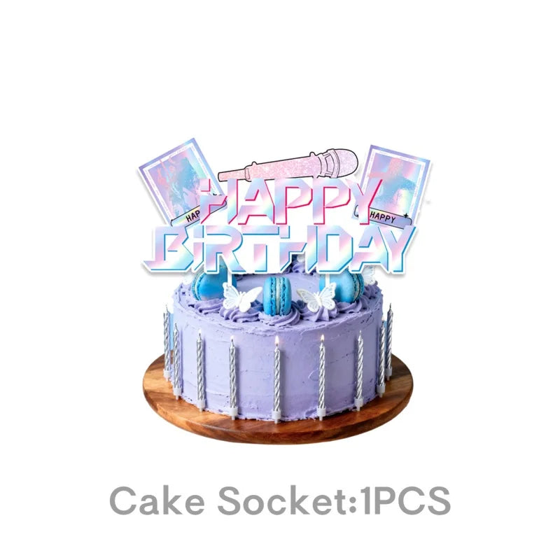 A purple and pink birthday cake decorated with microphones and text, sold as a single piece.