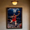 A framed photograph of Dennis Rodman playing basketball, jumping for a shot, against a blurred background.