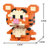 An orange and black animal model built from LEGO-style micro building blocks.