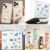 A collection of aesthetic ocean life stickers for DIY crafts and personalization shown on a phone case and craft sheet.