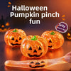 Orange Halloween pumpkin stress ball with a carved face and a translucent skin texture