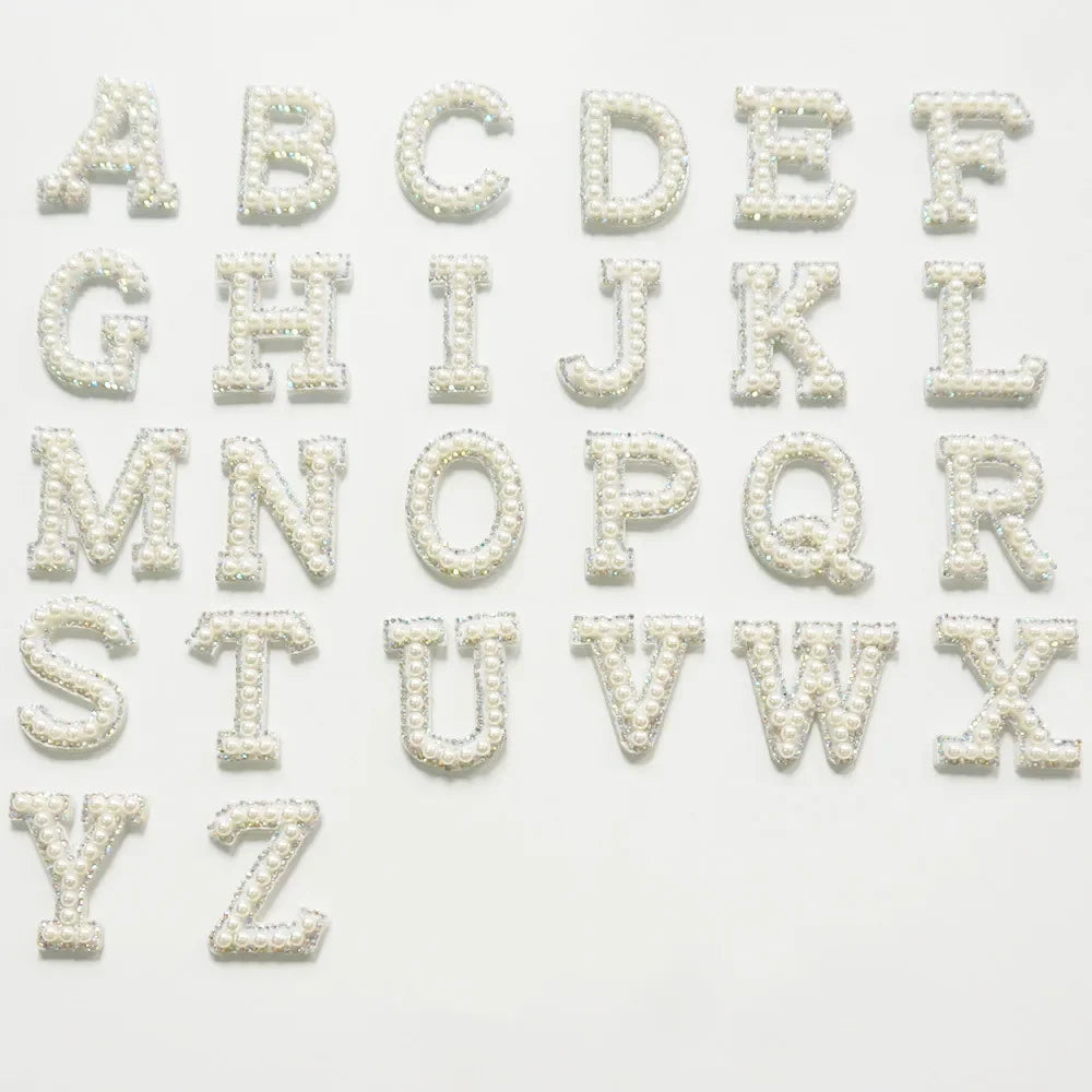A set of white rhinestone alphabet letter patches from A to Z for clothing