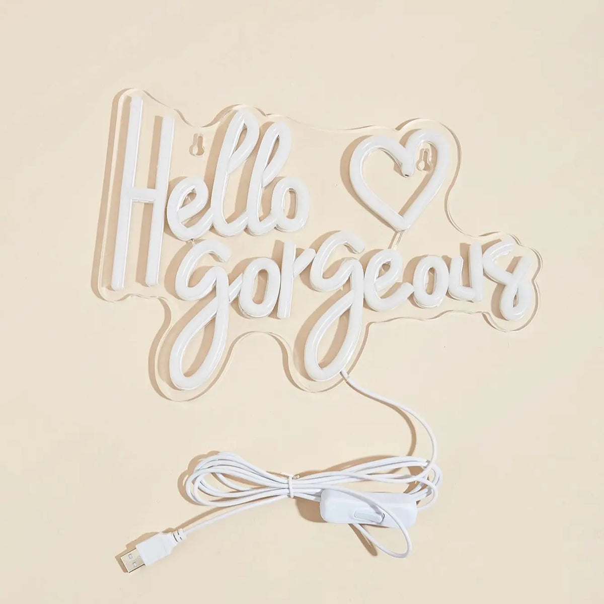 A white LED neon sign shaped like the words Hello Gorgeous with a USB power cord.