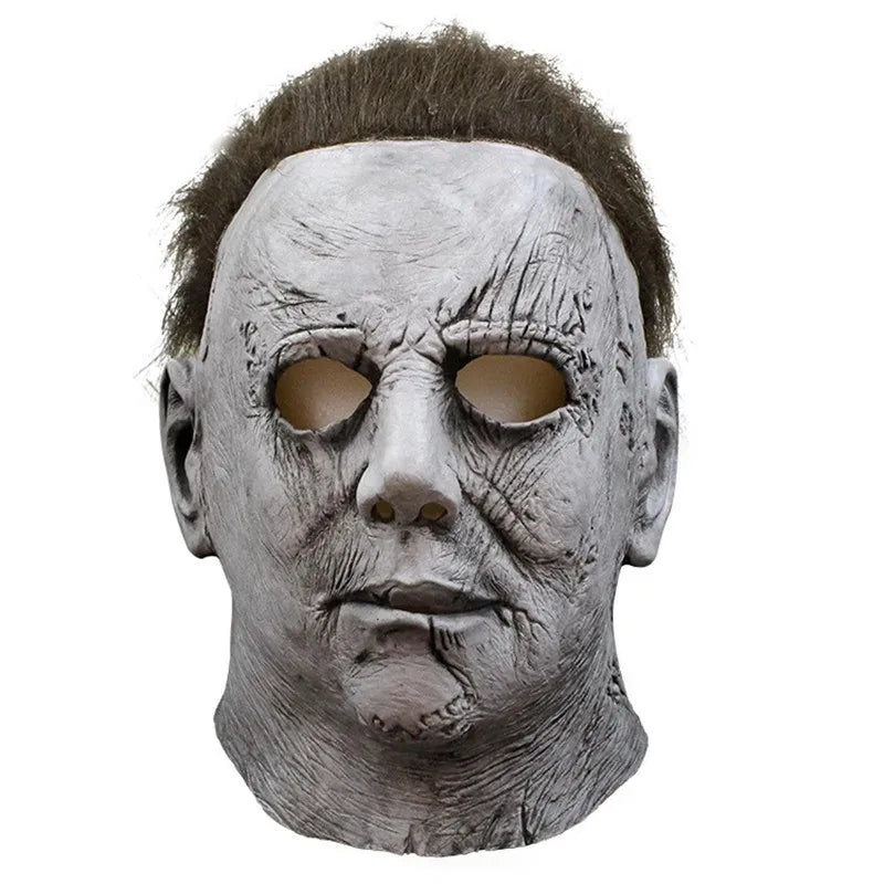 A realistic, weathered gray latex horror mask resembling Michael Myers from the 1978 film.