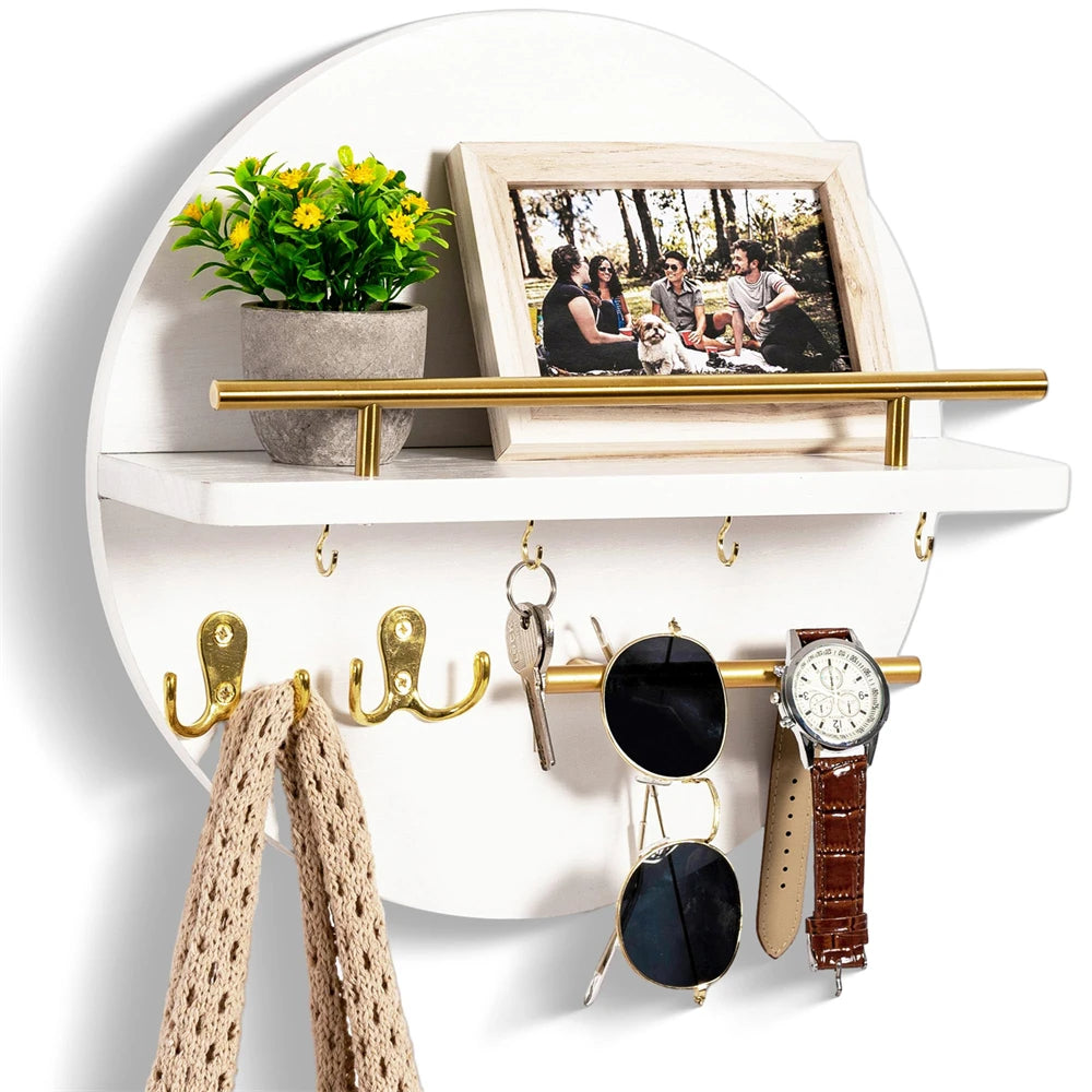 A circular wooden wall key holder with a shelf displaying various keys and jewelry.
