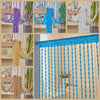 Various beaded string curtains in purple, blue, white, and beige hanging from a rod.