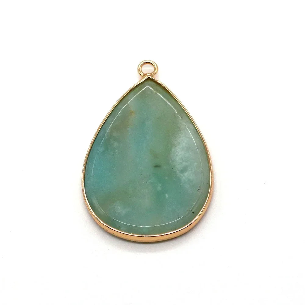 A teardrop-shaped light blue green agate and rose quartz pendant charm with a gold-colored bezel setting.