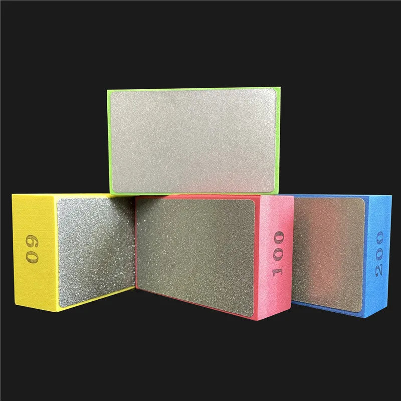Three rectangular polishing pads in yellow, green, pink, and blue with numbers 60, 100, and 200