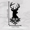 Black metal deer head wall sculpture with antlers and a snowflake base.