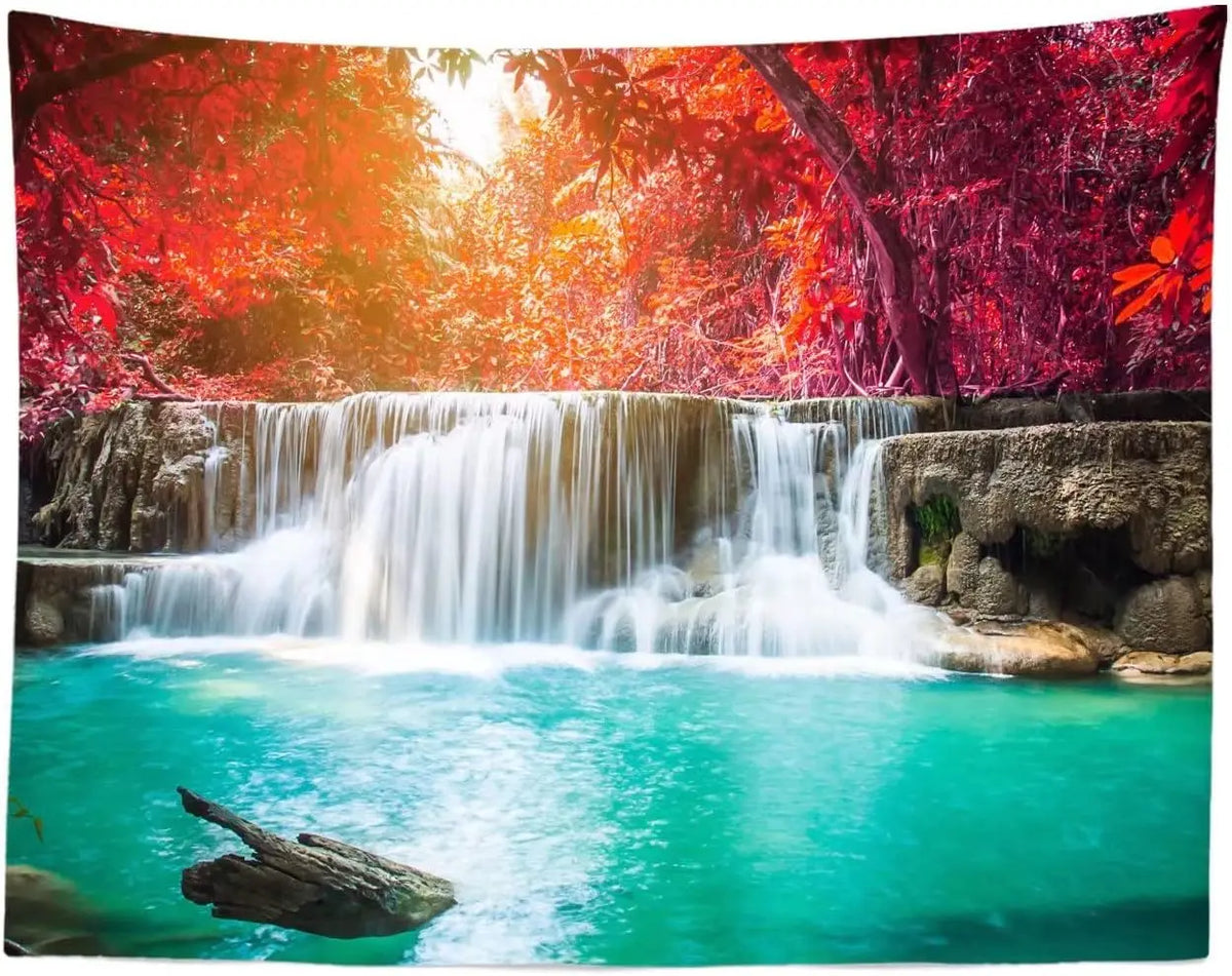 A panoramic photograph of a vibrant waterfall cascading into a clear turquoise pool surrounded by lush red and orange foliage
