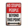 A vintage metal tin sign with red and white text that reads NO STUPID PEOPLE BEYOND THIS POINT.