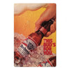 A hand holds a bottle of Budweis beer against a bright yellow background with ice.