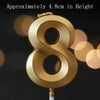 A golden number eight cake candle for birthdays and celebrations