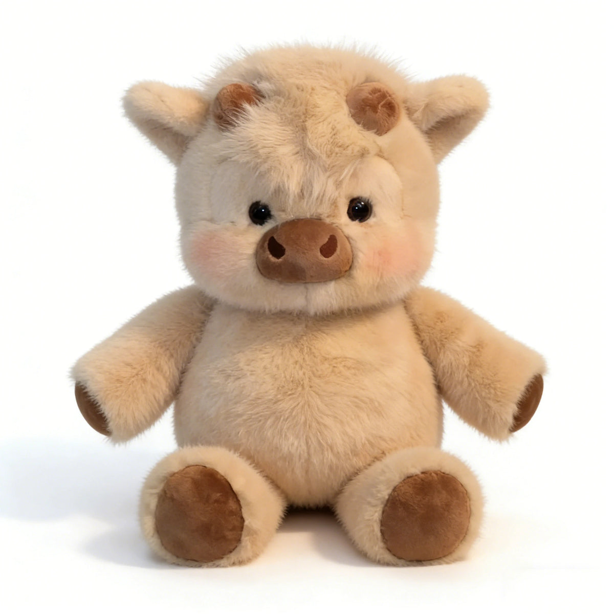 A soft, light tan West Highland calf plush toy with round eyes and floppy ears.