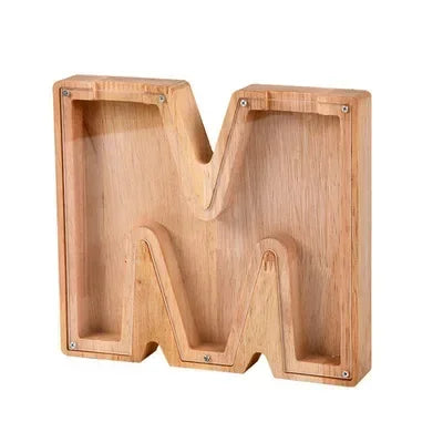 Wooden alphabet letter M piggy bank coin box for kids made of light wood.