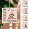 Un ensemble de cartes d'argent en bois décoratives avec des thèmes de Noël comme le Père Noël, les rennes et un sapin de Noël