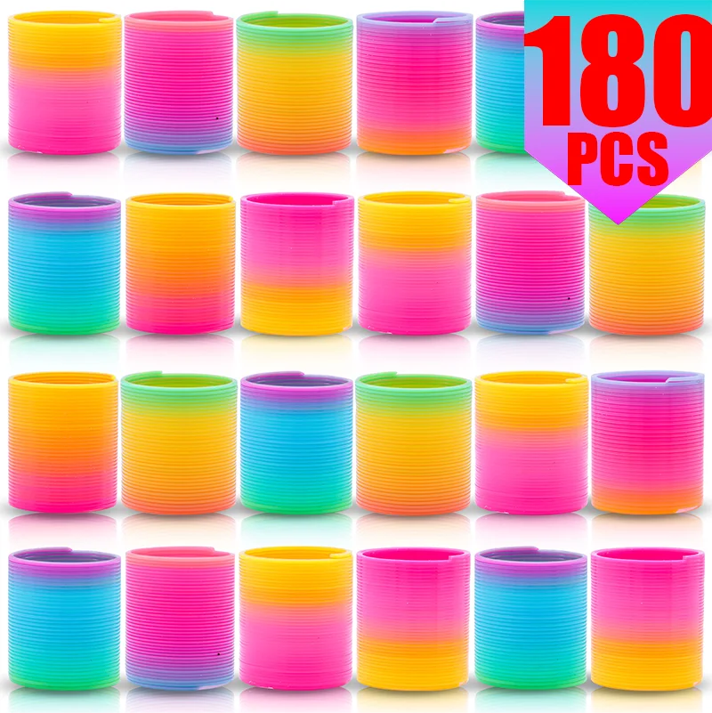 A collection of 180 colorful, striped plastic party favors in various rainbow colors.