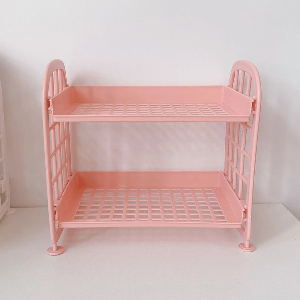Pinker multifunktionaler Schreibtisch-Organizer mit zwei Ebenenblechen.