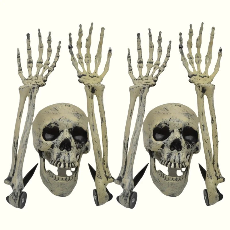 A set of Halloween skeleton bone garden stakes featuring skull and hand designs.