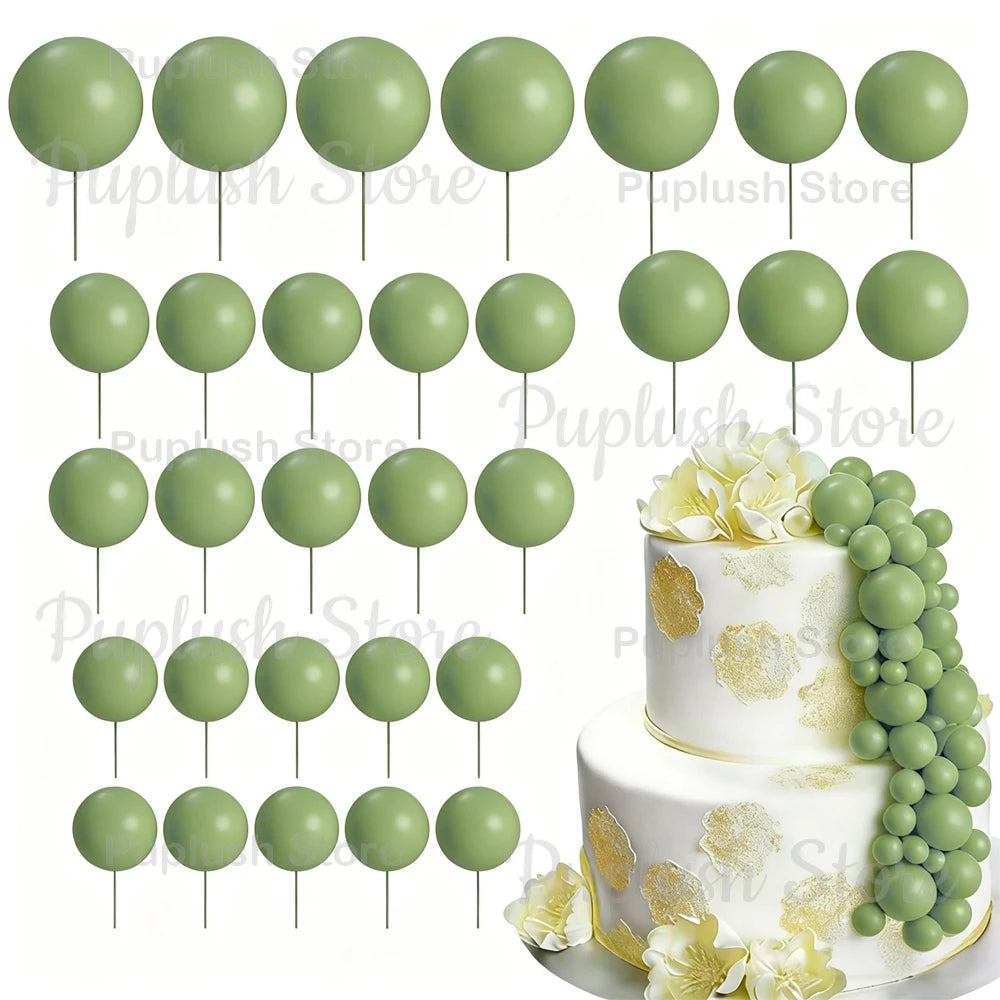 A set of light green foam cake toppers on sticks, including various sizes and shapes.