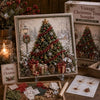 A framed Christmas 3D fabric poke art kit featuring a decorated evergreen tree in a snowy winter forest scene.