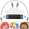 Black table balloon arch kit showing various metal and plastic components for creating decorative arches