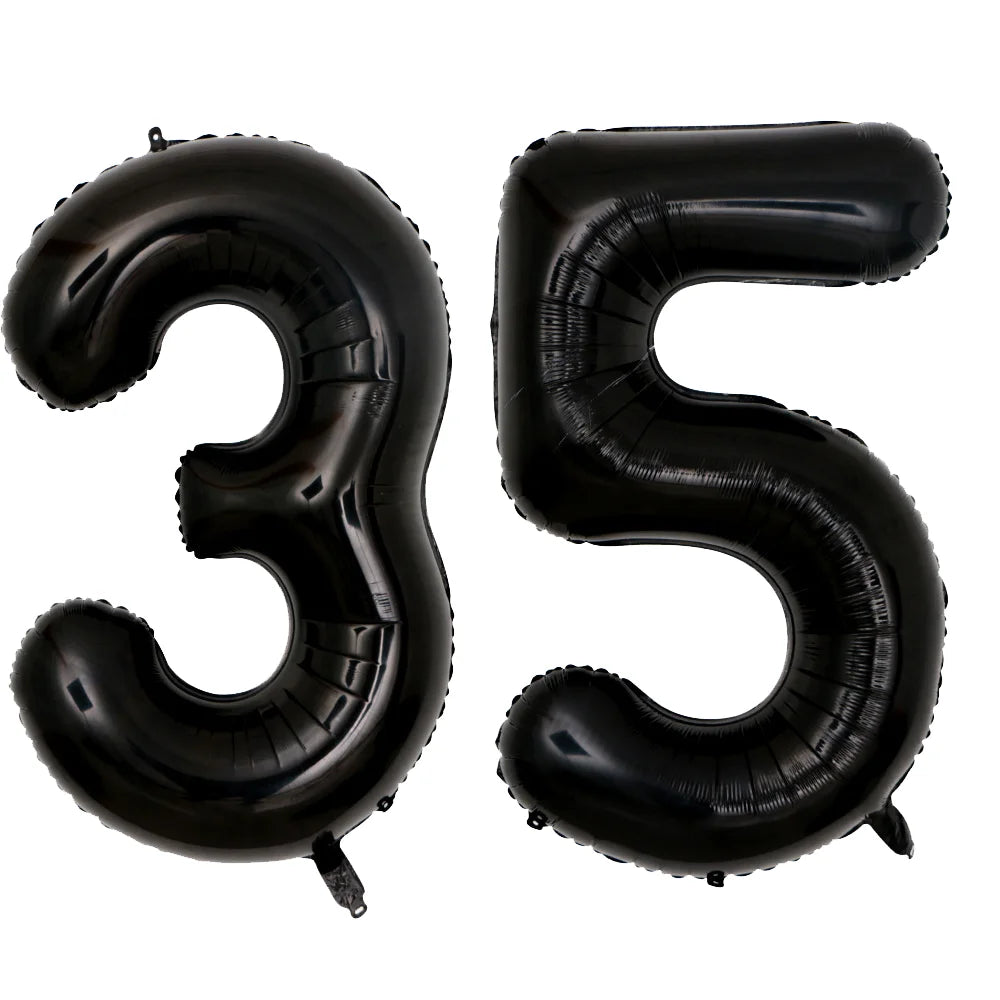 A set of two black foil balloons shaped like the number 35