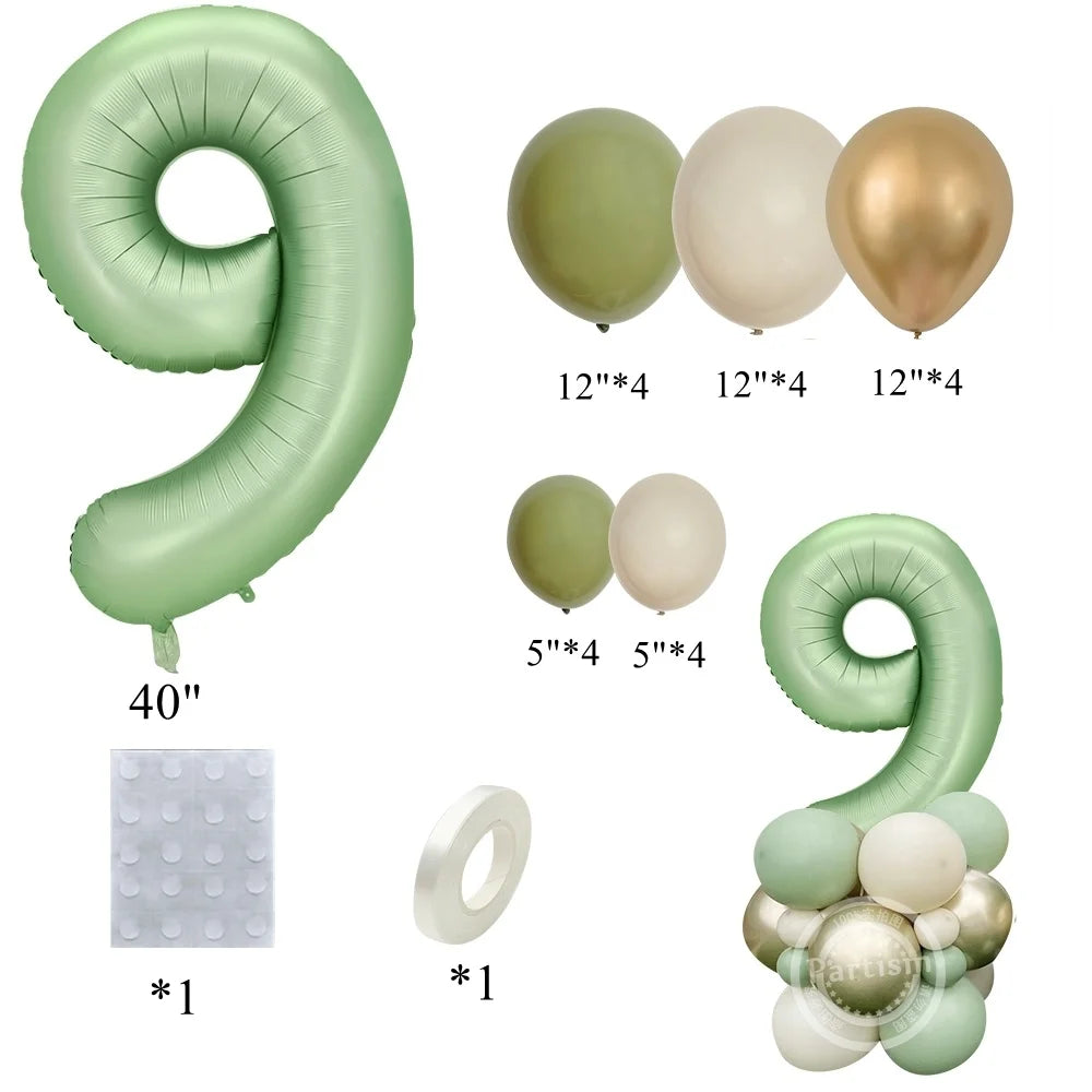 A set of vintage green and gold foil balloons shaped like the number 9 for birthday decor