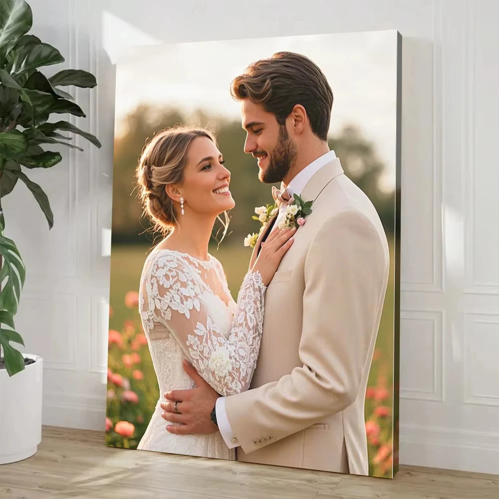 A portrait of a happy couple in wedding attire, framed as canvas wall art.
