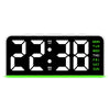 Reloj de alarma LED digital mostrando las 22:38 con luz de fondo verde e indicadores del día de la semana.