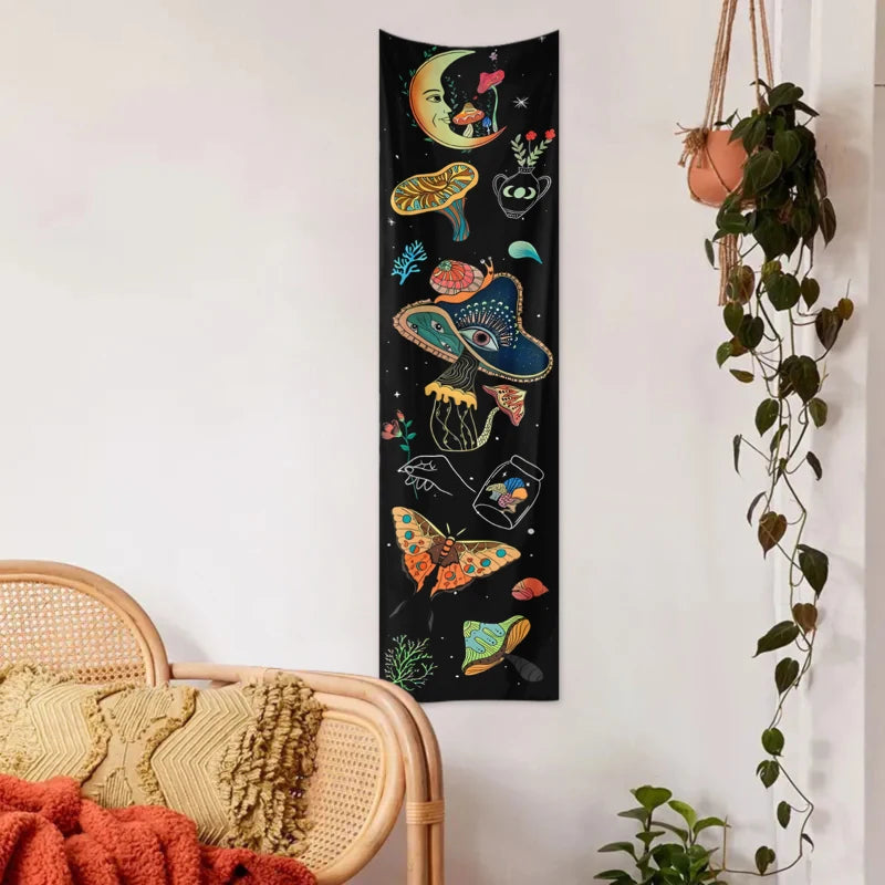 Black tapestry featuring a celestial design of the sun, moon, and galaxy alongside various mushrooms and flowers.