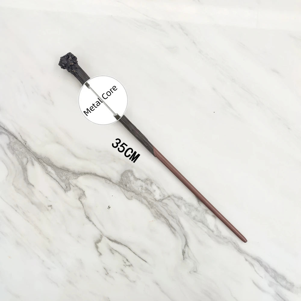 A black metal magic wand replica with a metal core is displayed on a white marble surface.