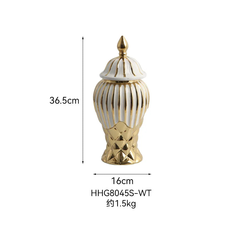 Gold and white ceramic decorative vase with a lid, measuring 36.5cm.