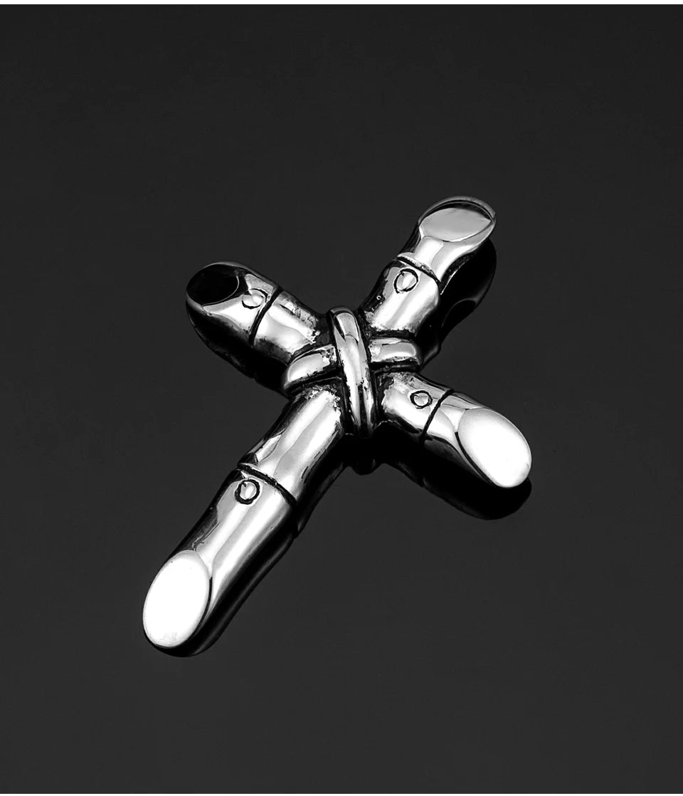 A silver stainless steel cross necklace pendant with a textured design.