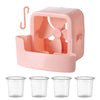 A pink portable ice-cooling floor fan in a square container with a handle and four blades, shown next to several clear plasti
