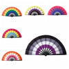A collection of colorful folding hand fans in rainbow and striped patterns.