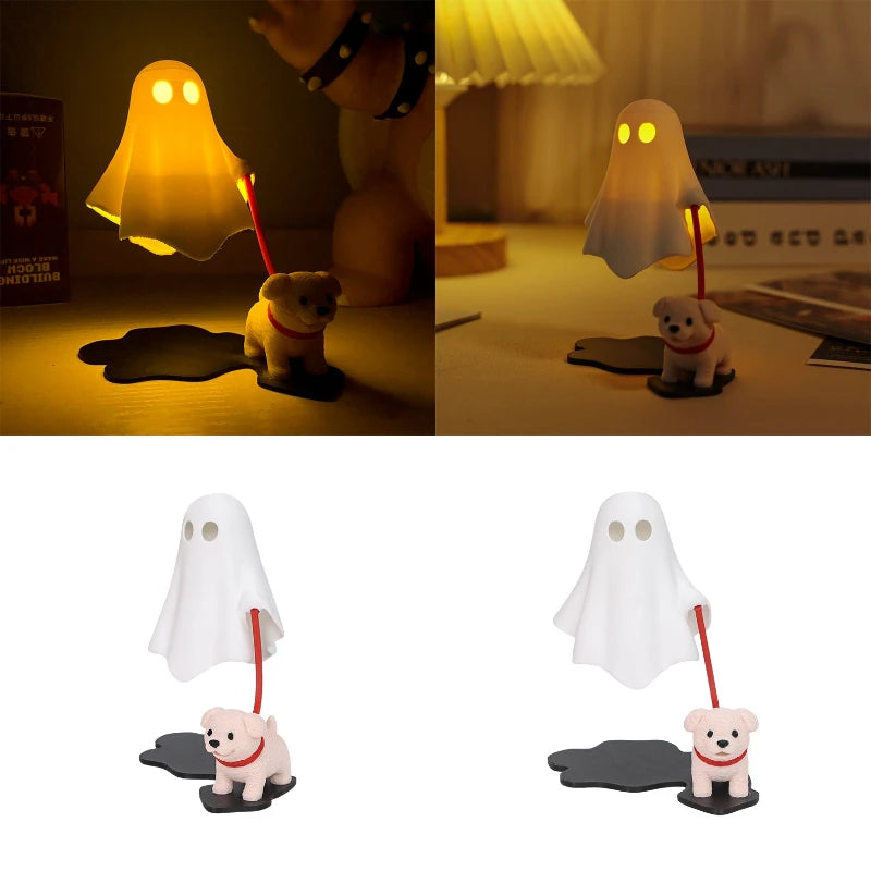 Three 3D printed ghost figurines with dogs, illuminated by a light source on a desk.