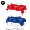 Disposable PVC tablecloths in red and blue featuring spider web designs for parties
