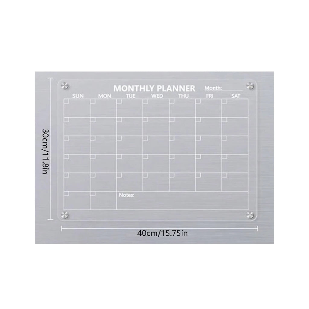 A monthly planner grid displayed on a silver magnetic acrylic board with labeled days and notes section.