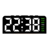 A black digital alarm clock displaying the time 22:38 and days of the week.