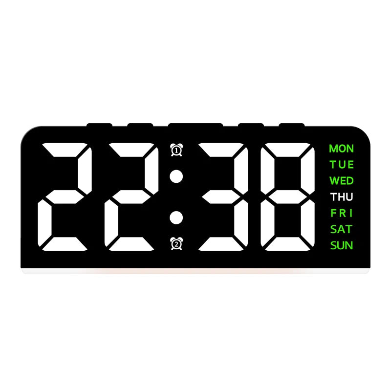 A black digital alarm clock displaying the time 22:38 and days of the week.