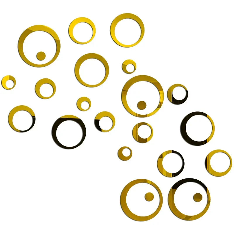 A collection of gold and black circular polka dot stickers scattered across a white background.