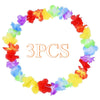 A circular lei necklace made of colorful flowers, including red, yellow, blue, and purple petals.